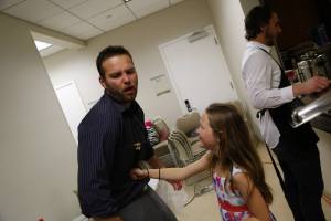 This mean little girl snuck into the shower and punched me in the gut!